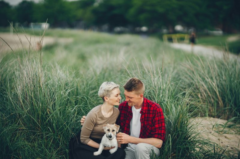 happy couple with dog